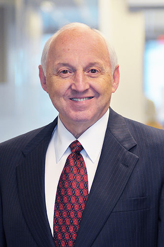 Leonard E Weisman, M.D.