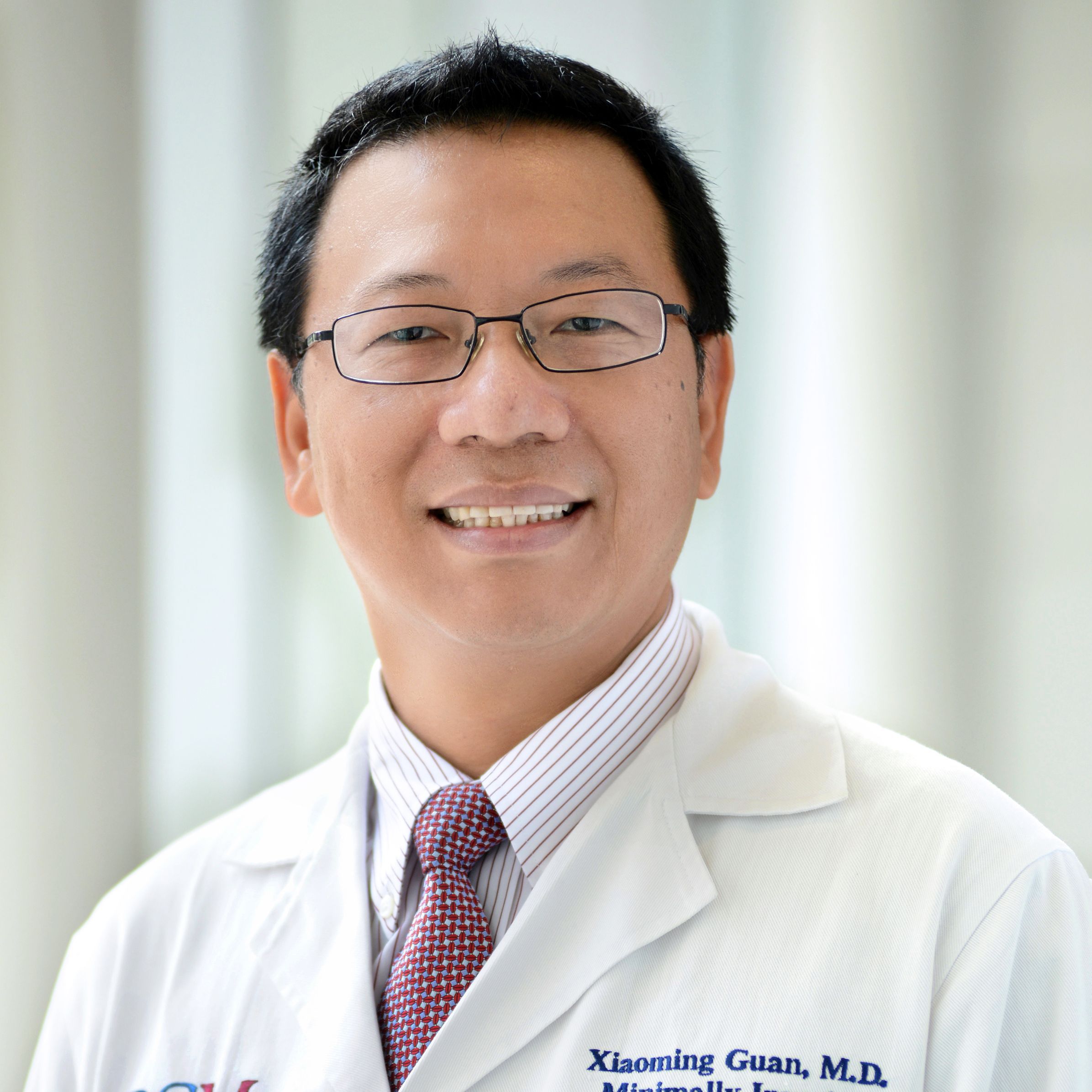 Xiaoming Guan, MD, PhD