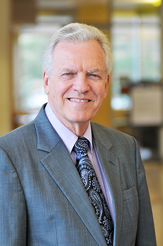 James W Lomax, M.D.