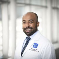 Headshot of Rollin George, M.D.