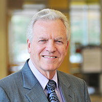 James W Lomax, M.D.